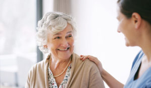 caregiver talking with senior client