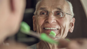 happy-senior-man-dental-hygiene